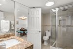 The Guest Bathroom Features a Walk-In Shower 